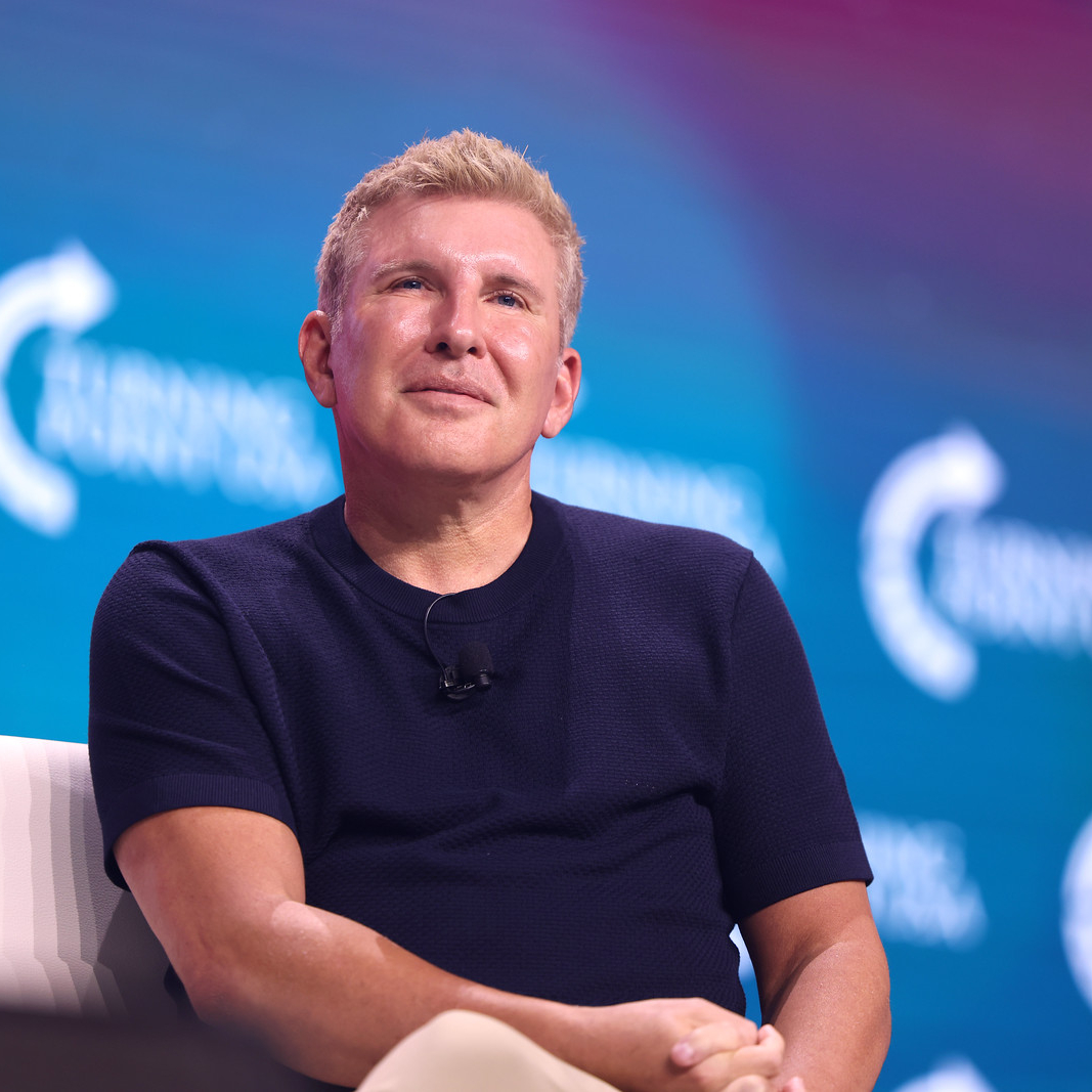 Portrait of Todd Chrisley, mentor figure in Jason Made's musical journey, speaking at an event